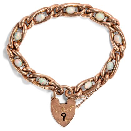 Rotgold-Armband mit Opal-Cabochons und Schloss in Herzform, Birmingham 1903 Rotgold-Armband mit Opal-Cabochons und Schloss in Herzform, Birmingham 1903