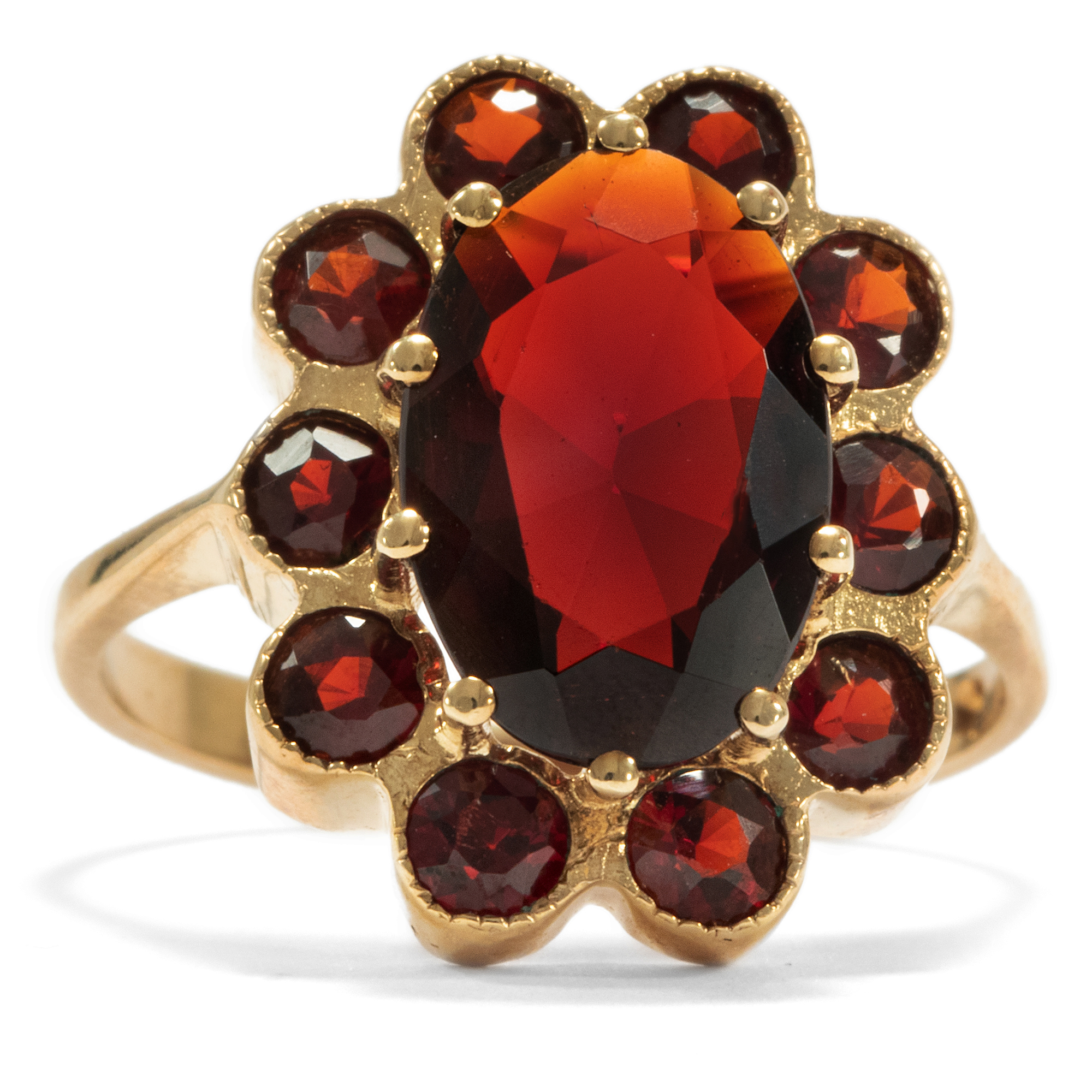 Large gold garnet ring, mid-20th century.