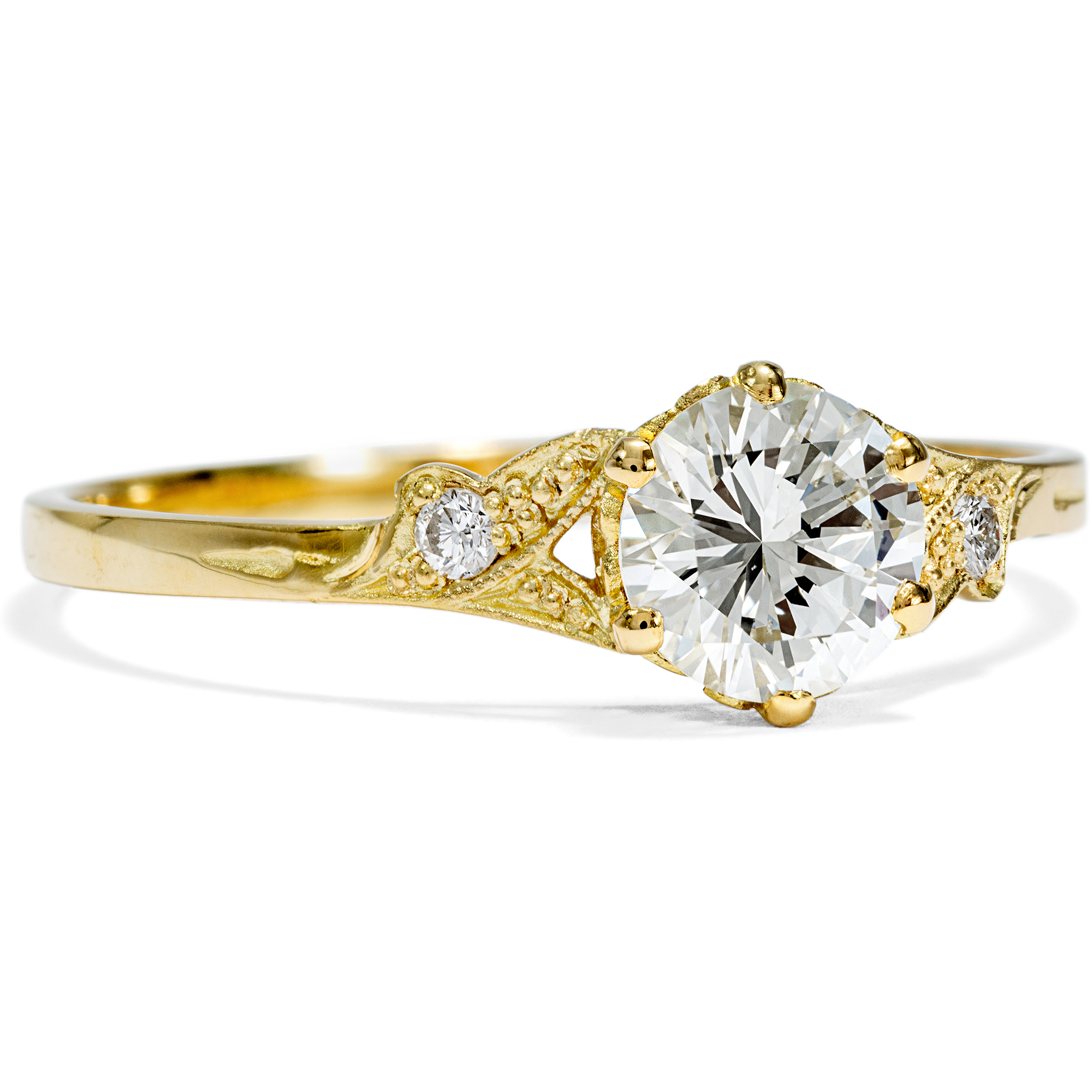 Delicate yellow gold ring with 0.71 ct brilliant-cut diamond from our workshop