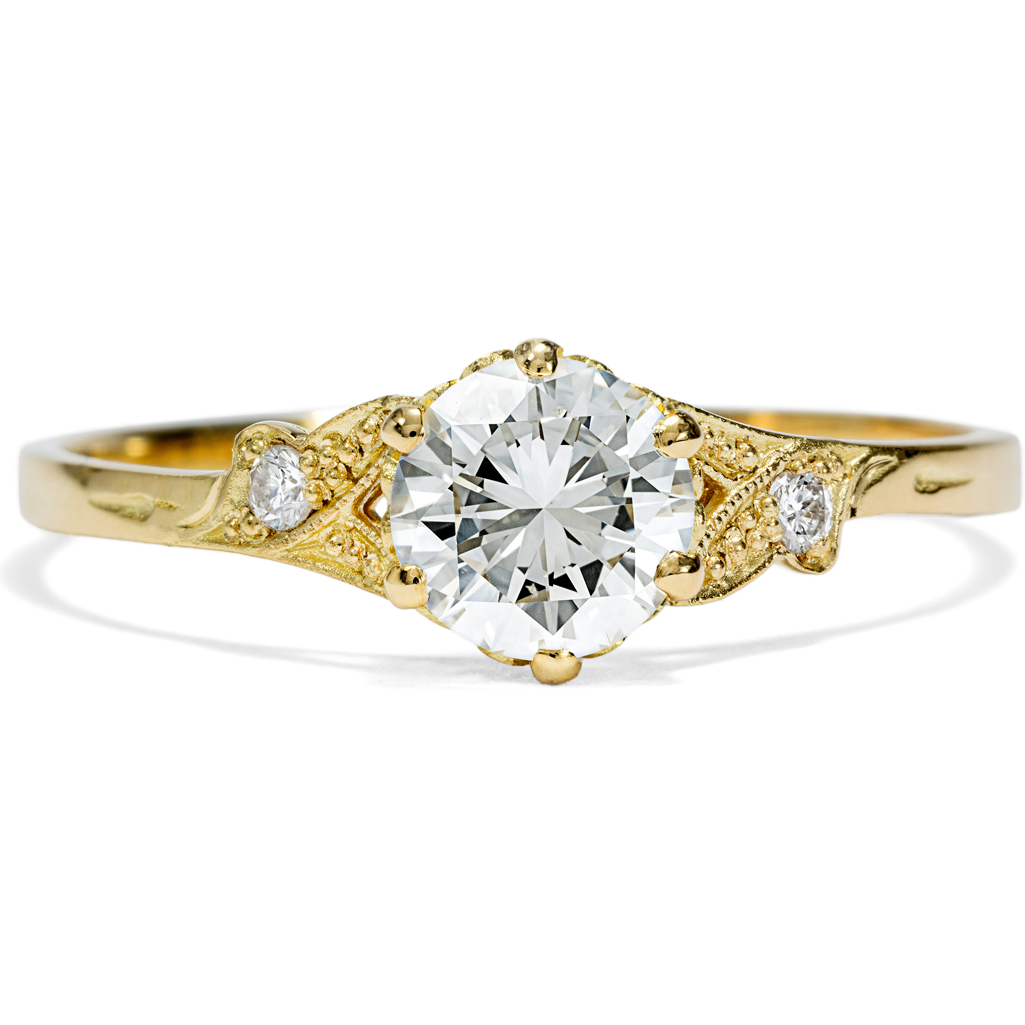 Delicate yellow gold ring with 0.71 ct brilliant-cut diamond from our workshop