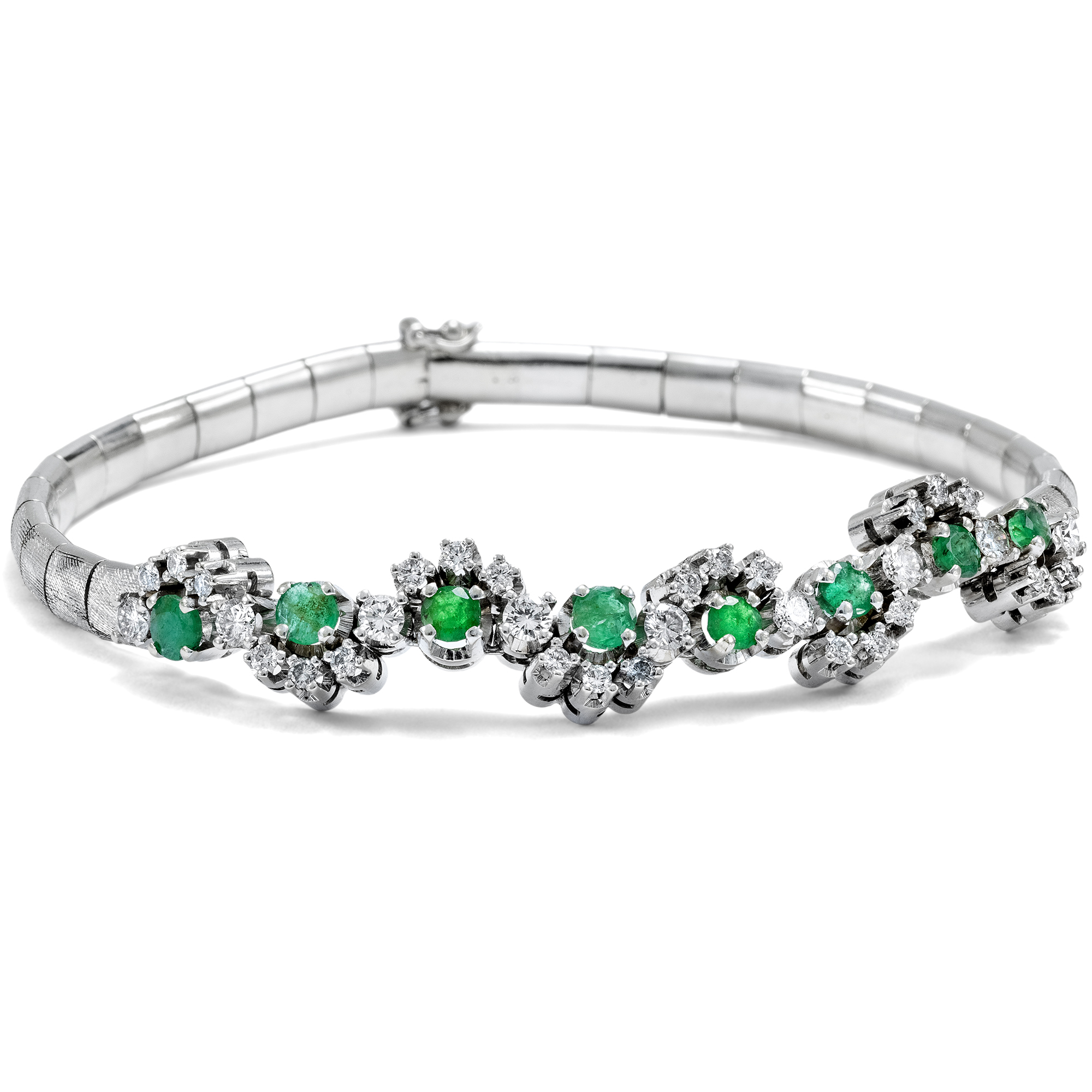 Elegant vintage bracelet with emeralds & diamonds in white gold, circa 1975