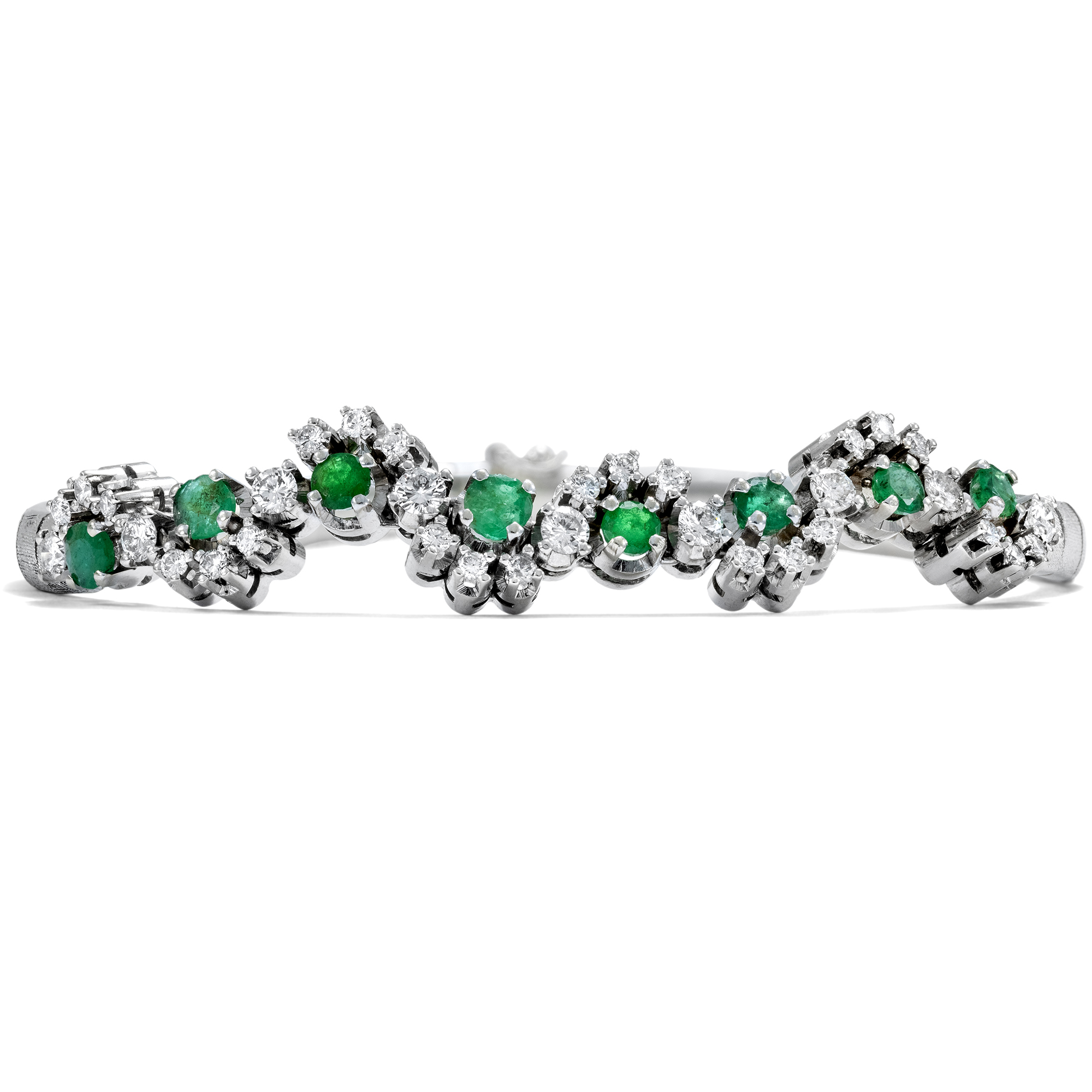 Elegant vintage bracelet with emeralds & diamonds in white gold, circa 1975