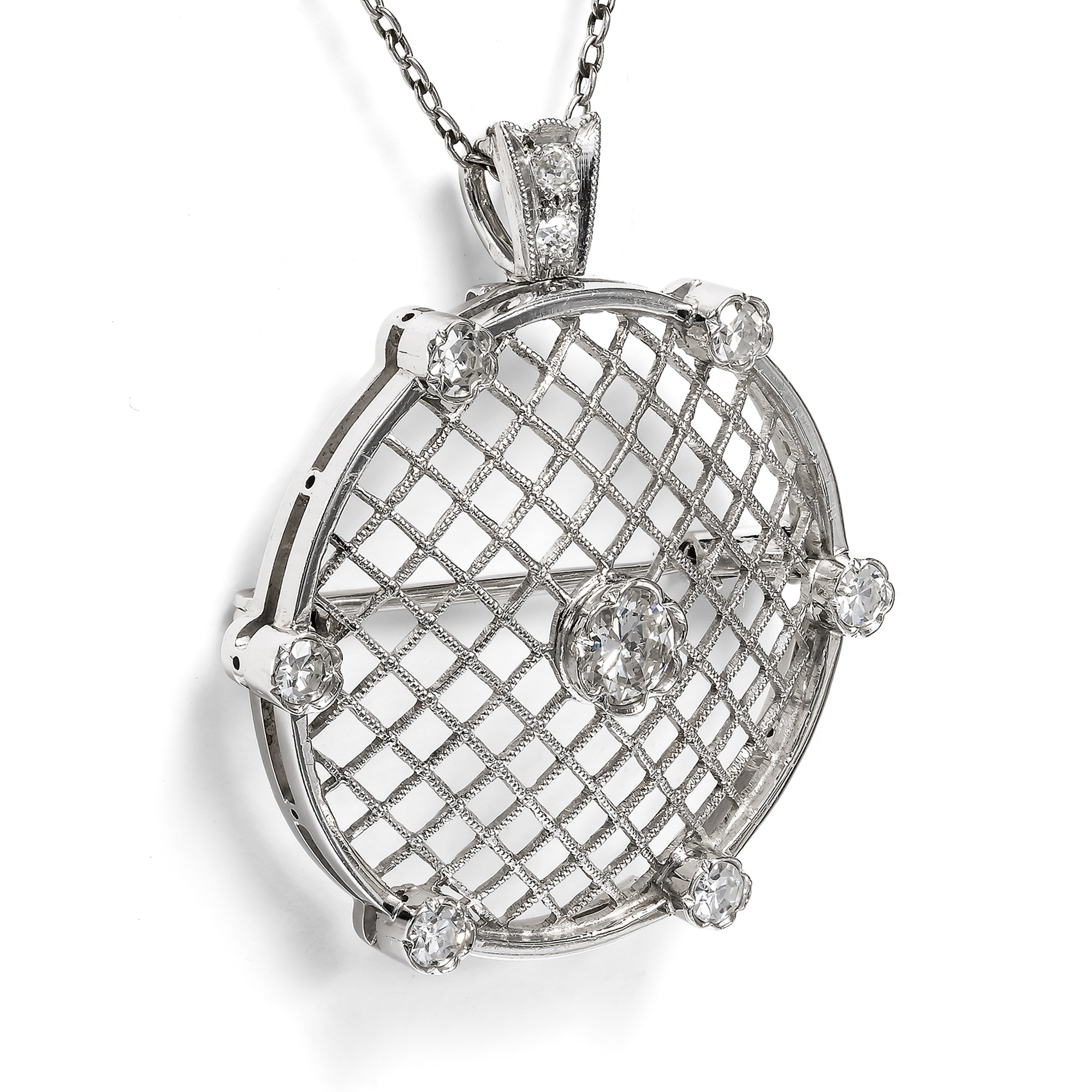 Elegante Anhänger/Brosche mit Diamanten in Weißgold, um 1990 Elegante Anhänger/Brosche mit Diamanten in Weißgold, um 1990