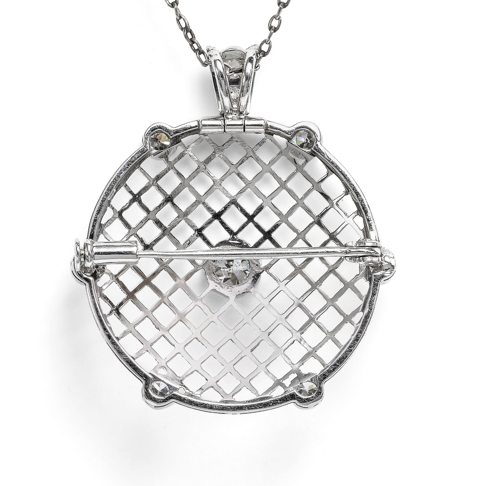 Elegante Anhänger/Brosche mit Diamanten in Weißgold, um 1990 Elegante Anhänger/Brosche mit Diamanten in Weißgold, um 1990