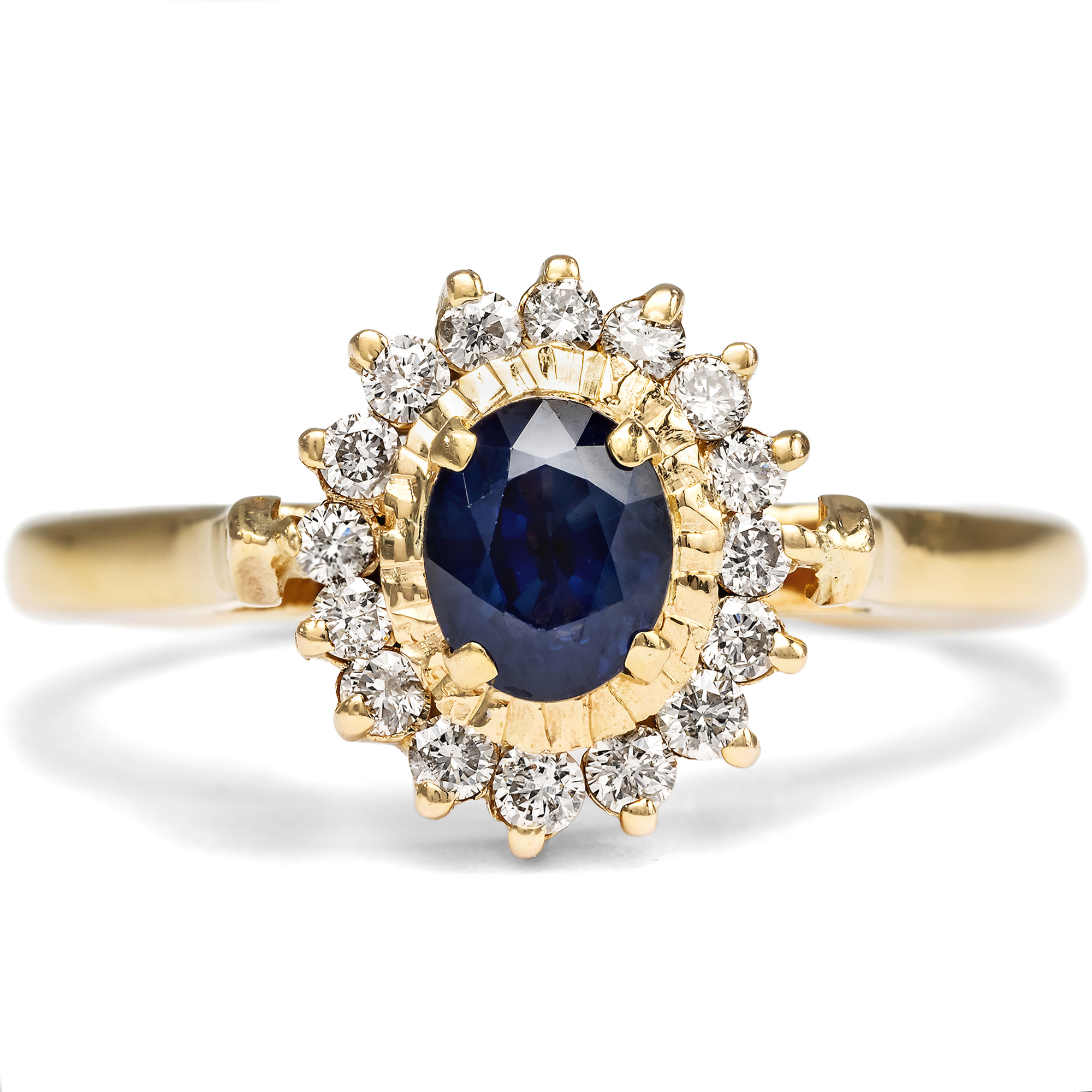 Feiner Entourage-Ring mit Saphir & Brillanten in Gold, um 1985 Feiner Entourage-Ring mit Saphir & Brillanten in Gold, um 1985