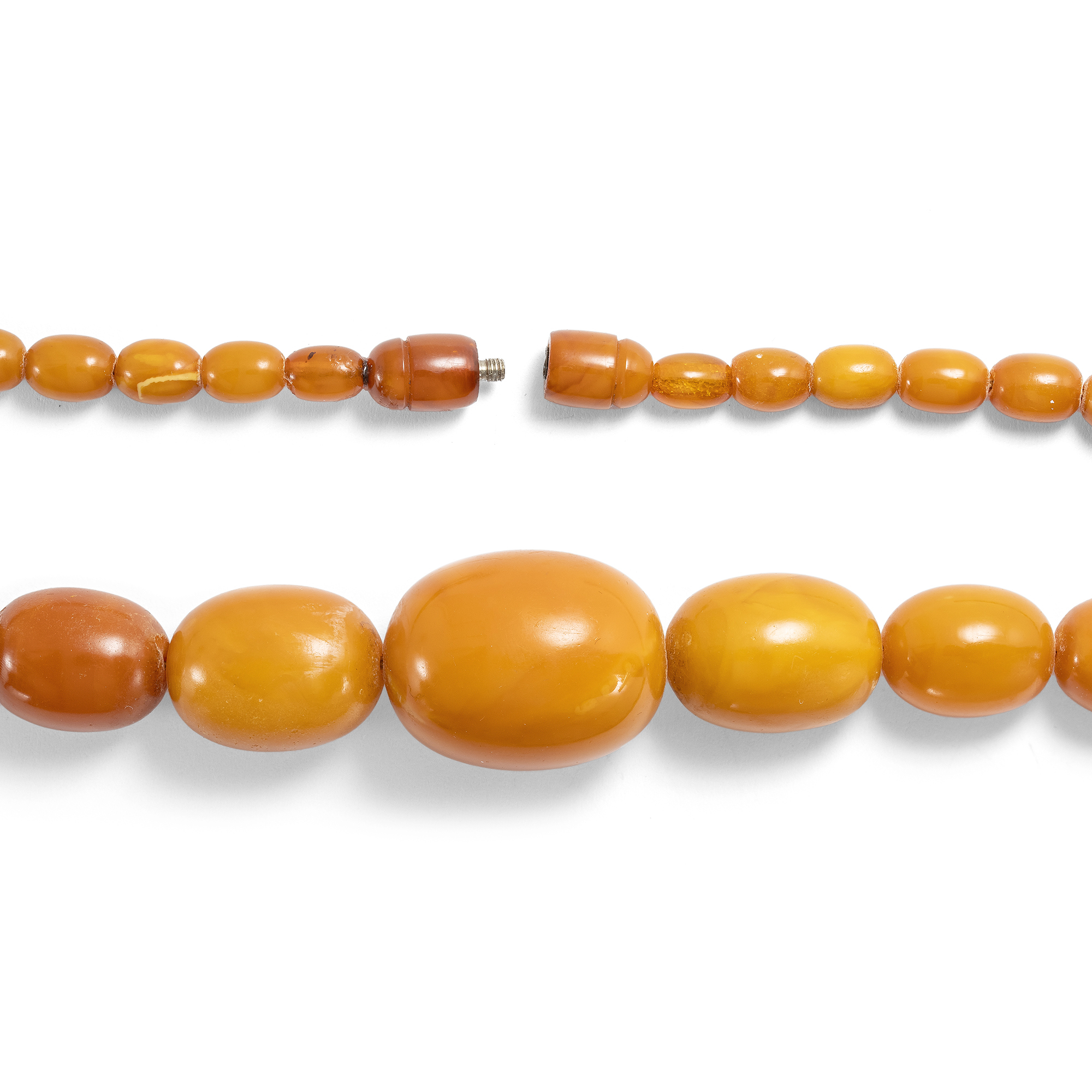 Antikes Collier aus „Butterscotch“- Bernstein in Olivenform, um 1930 Antikes Collier aus „Butterscotch“- Bernstein in Olivenform, um 1930