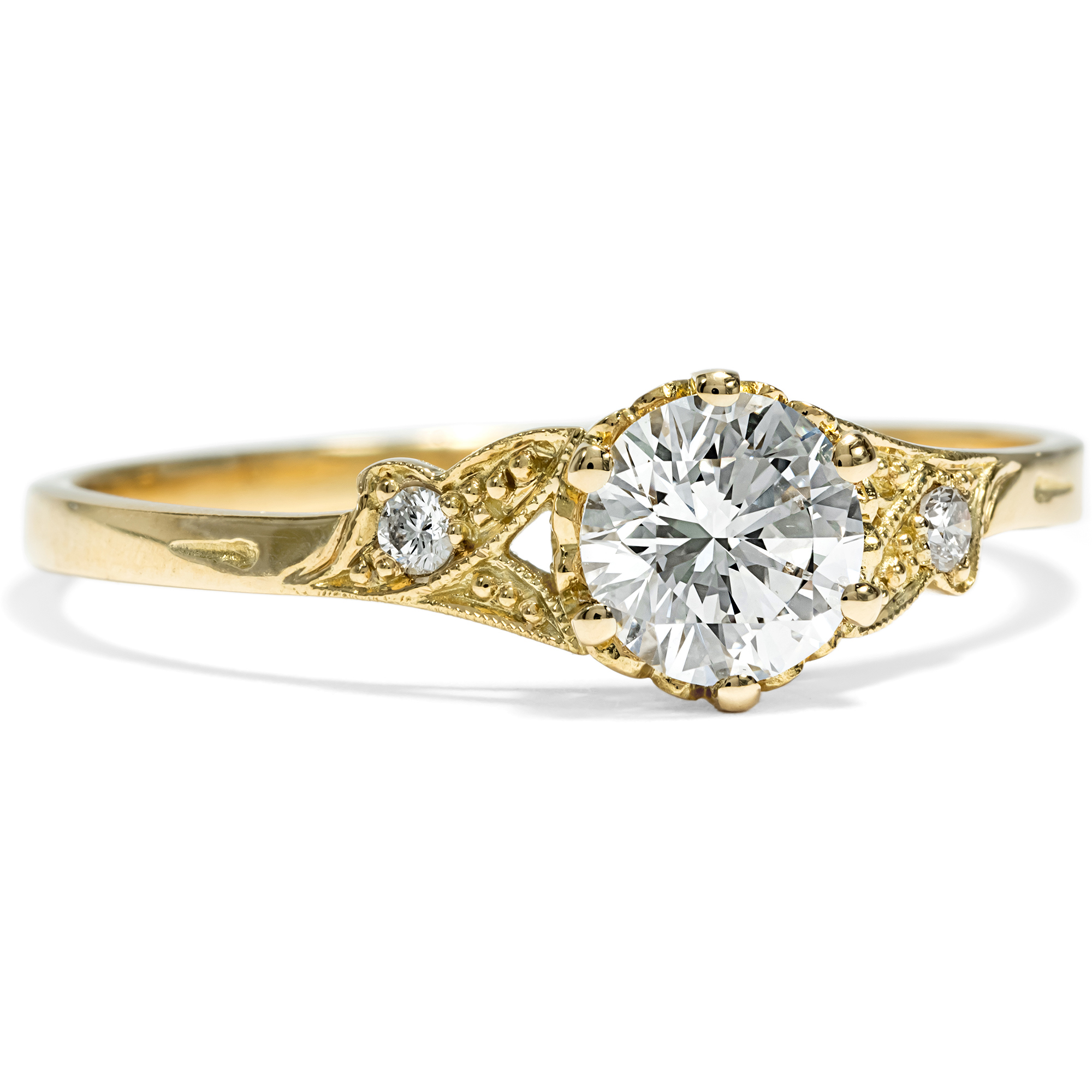 Zarter Ring mit lupenreinem 0,54 ct Brillant in Gold aus unserer Werkstatt Zarter Ring mit lupenreinem 0,54 ct Brillant in Gold aus unserer Werkstatt