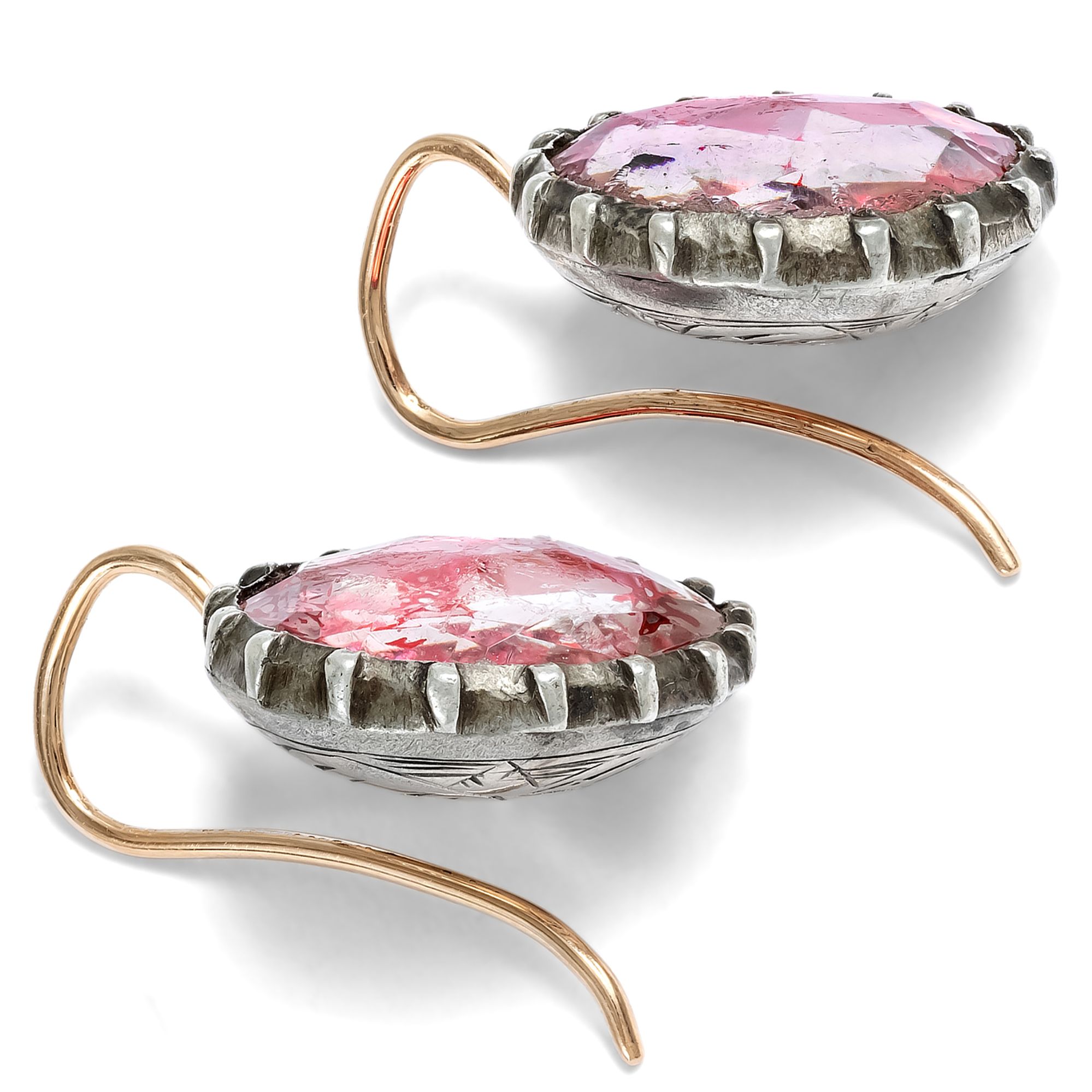 Earrings with antique buttons from around 1800, featuring pink-tinted glass stones, made in our workshop Earrings with antique buttons from around 1800, featuring pink-tinted glass stones, made in our workshop
