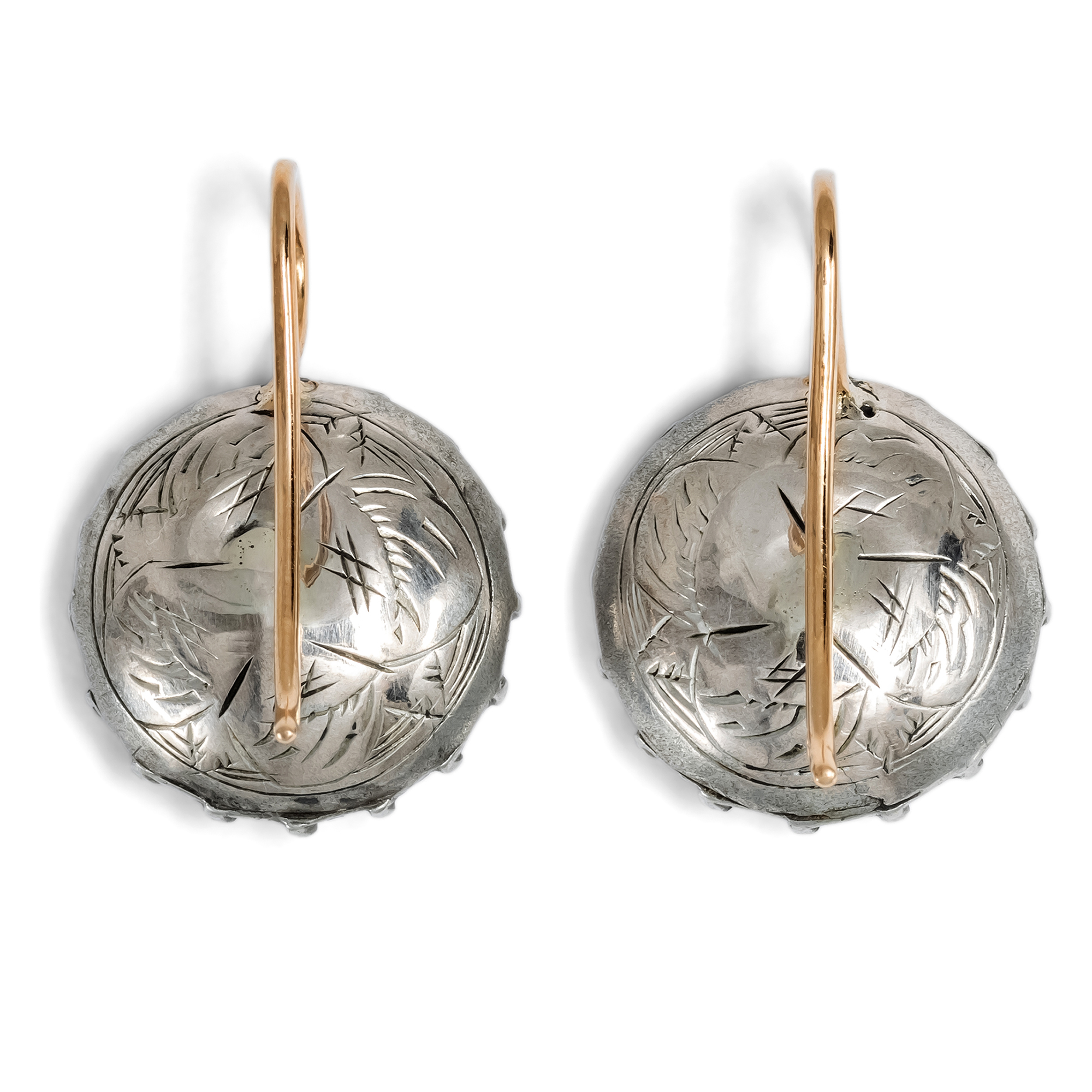 Earrings with antique buttons from around 1800, featuring pink-tinted glass stones, made in our workshop Earrings with antique buttons from around 1800, featuring pink-tinted glass stones, made in our workshop