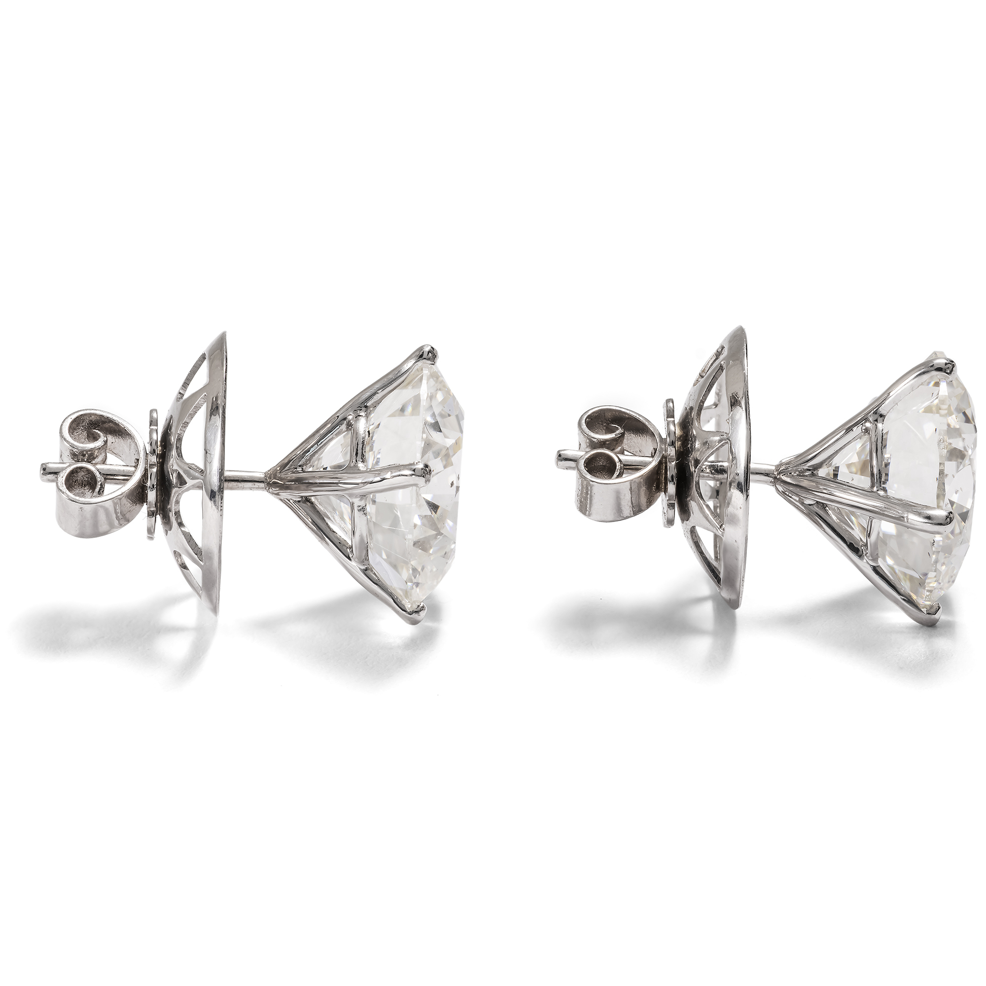 Beeindruckende Brillantsolitäre mit zus. 12,50 ct als Ohrstecker, um 1995 Beeindruckende Brillantsolitäre mit zus. 12,50 ct als Ohrstecker, um 1995