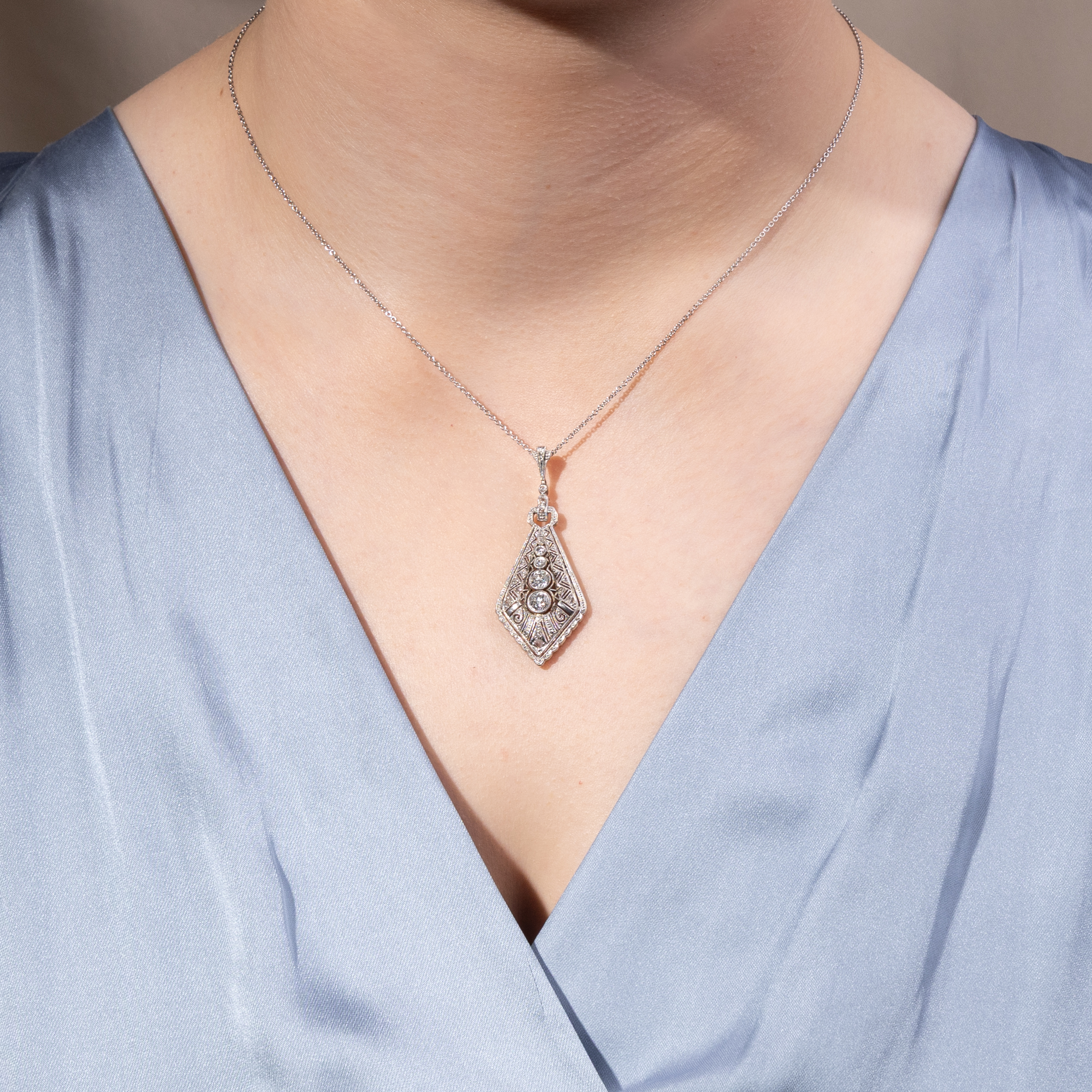 Glamorous Art Deco Pendant with a Diamond in Gold and Platinum on a Chain, circa 1930 Glamorous Art Deco Pendant with a Diamond in Gold and Platinum on a Chain, circa 1930
