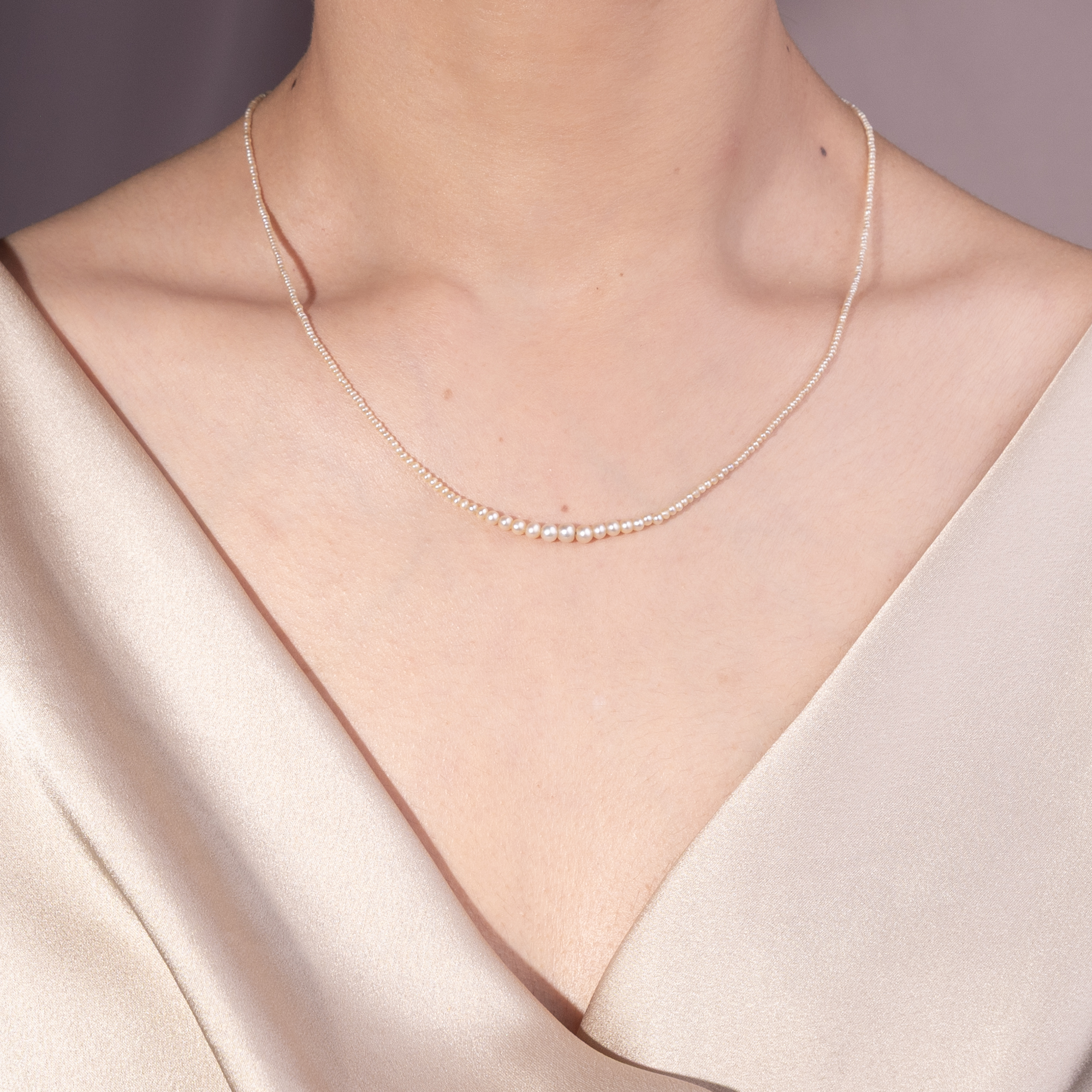 Zartes Collier aus Naturperlen mit Diamantschließe, München um 1925 Zartes Collier aus Naturperlen mit Diamantschließe, München um 1925